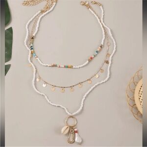 Bohemian Gold and White Layered Necklace Set.